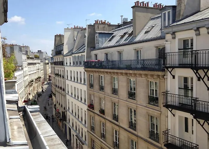 Parisian Flat Under The Roofs